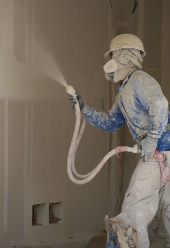 Spuitwerk spackspuiten latexspuiten muren spuitwerk